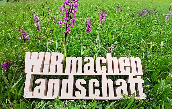 Holzschriftzug vür Orchideen.